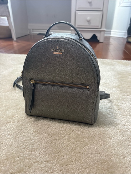 kate spade Handbags - kate spade Metallic Silver Pebbled Mini Backpack